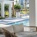 a seating area by a pool