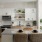a kitchen with a table and chairs