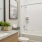 a bathroom with a tub sink and toilet
