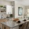 a kitchen with a dining table and a large island